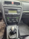 Skoda Octavia 1.9TDI 4X4  105hp-6ск-CLIMA  - 2700 € / 5280.74 лв. - 18433753 16